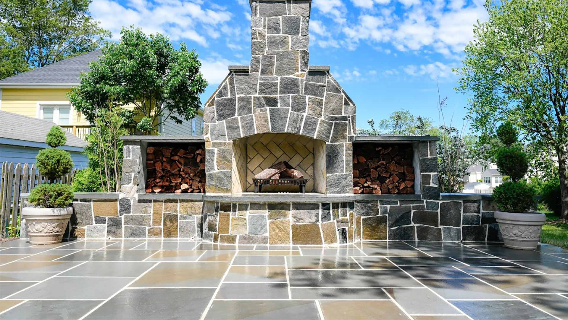 Custom outdoor fireplace installed at a home in Bristow, VA.