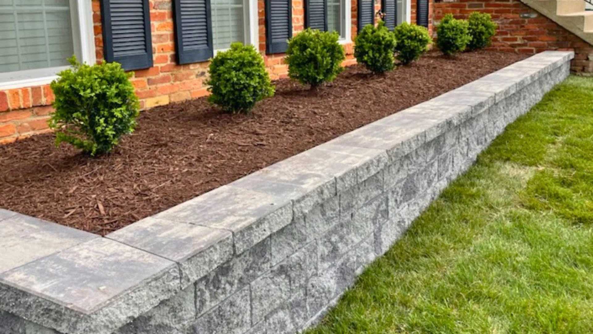 Issues That Come With Sloped Yards Can Be Fixed With a Retaining Wall