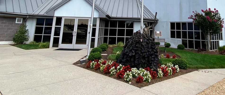 Commercial building in Bristow, VA, with annual flowers.