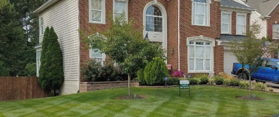 A property in Marumsco, VA, with a neat lawn and trees.