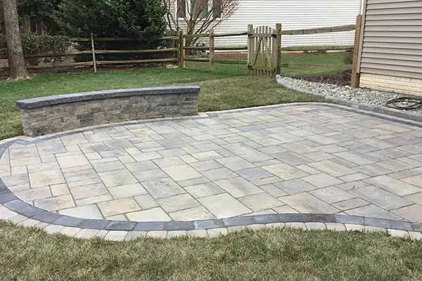 Stone patio and seating wall construction in Haymarket, VA.